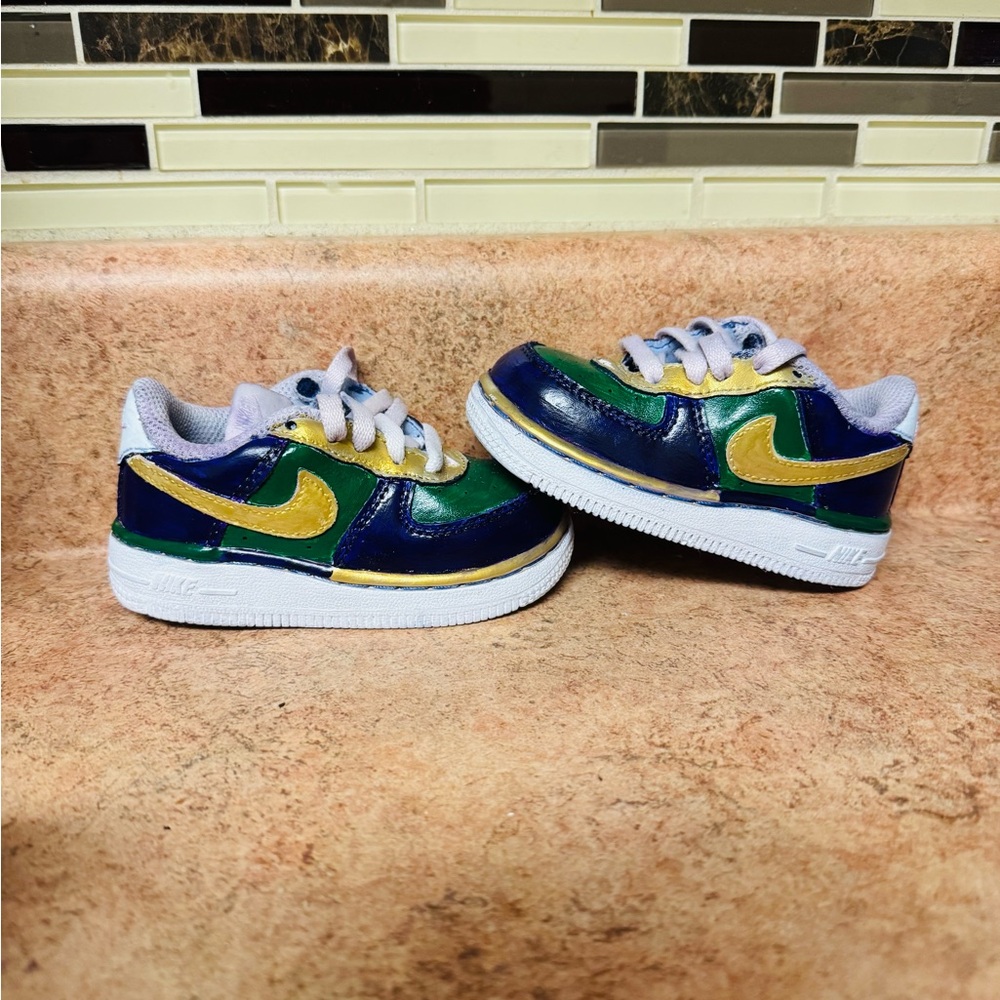 Kids Nike 5Y hand painted Mardi Gras shoes.
